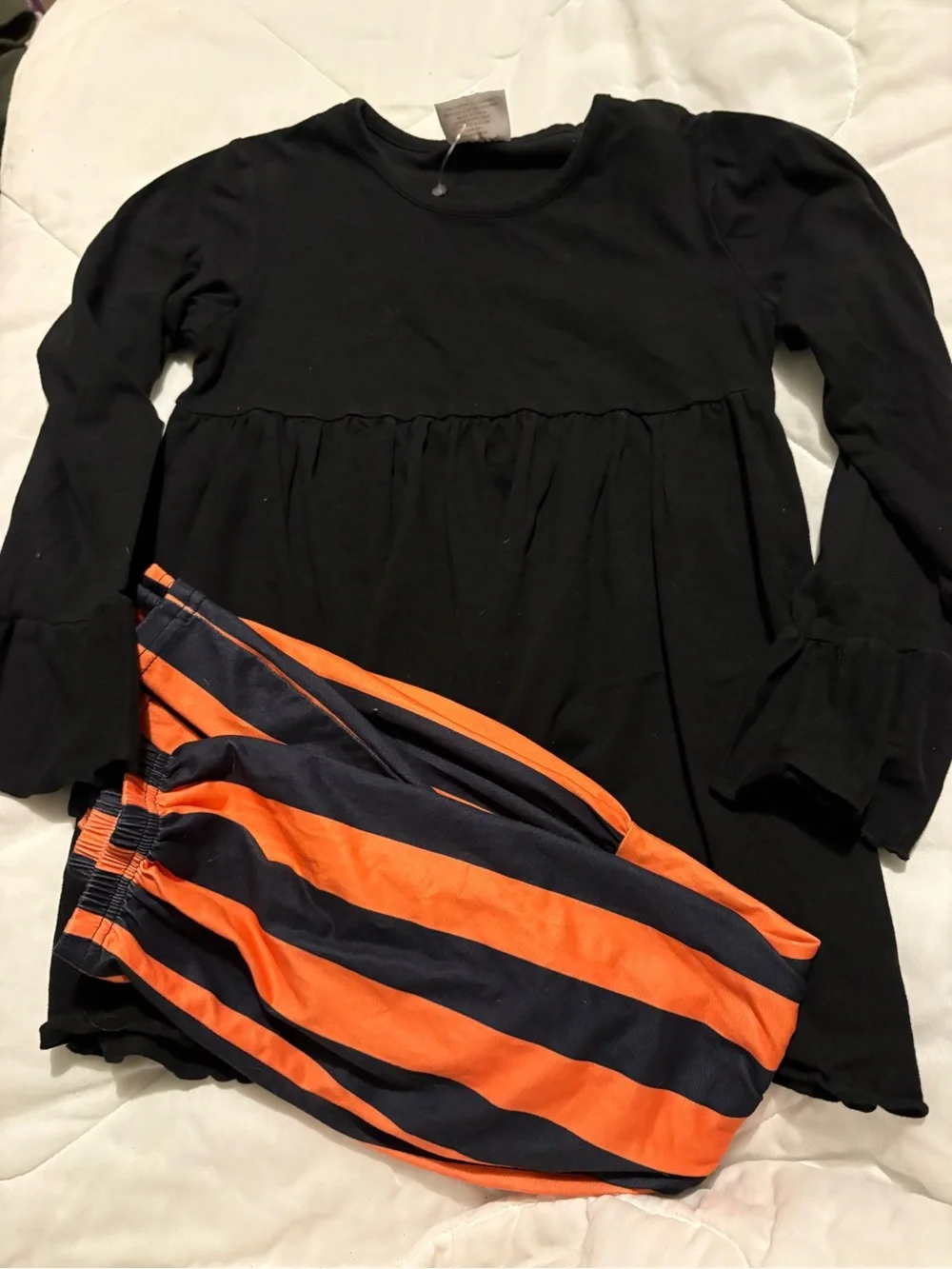 Orange and black boutique outfit